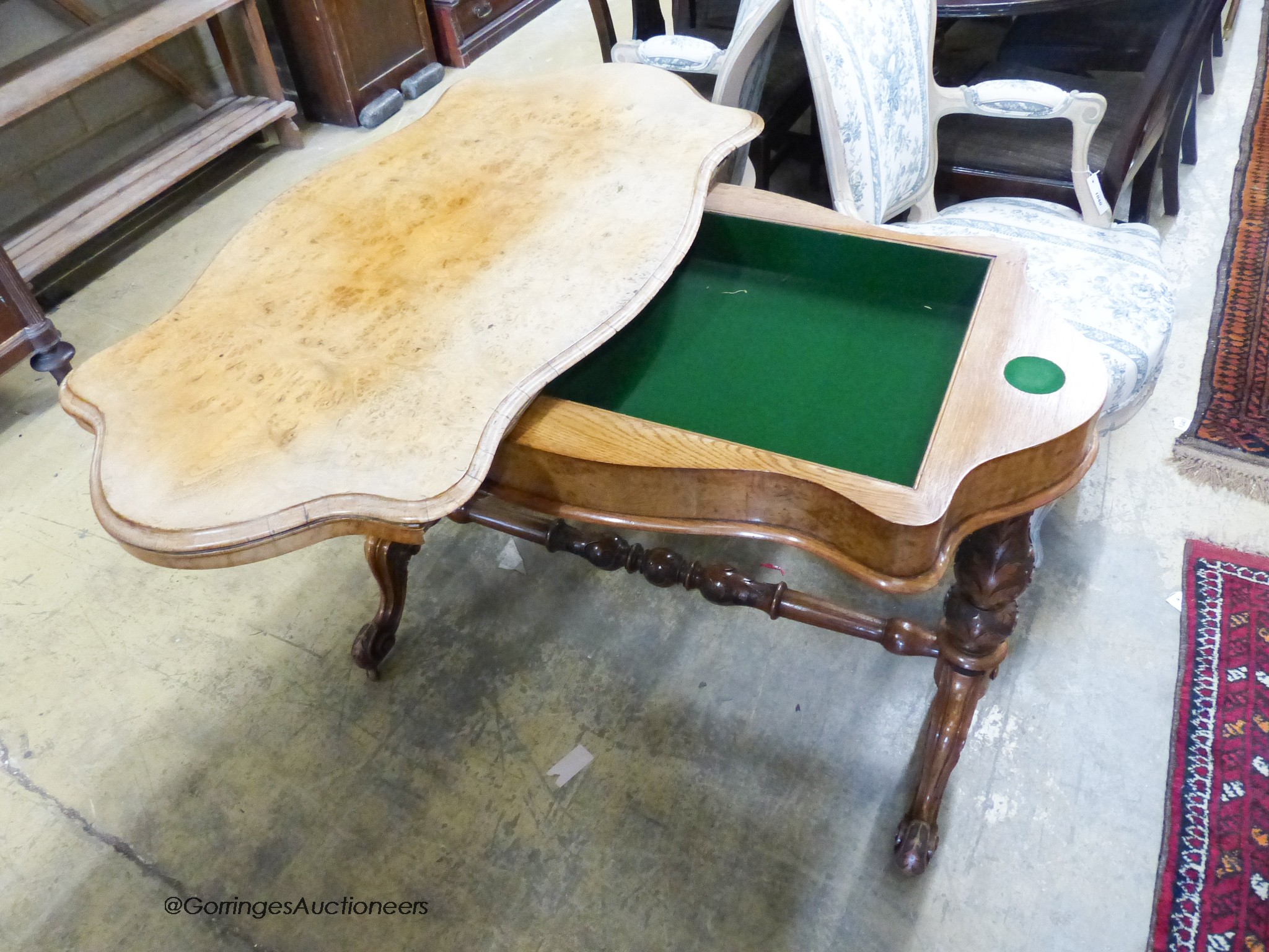 A Victorian pollard oak folding card table of rectangular serpentine form (faded) W-108, D-58, H-76cm.